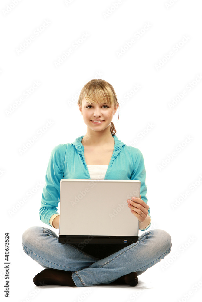 Student girl with laptop sitting cross-legged isolated Student girl with laptop sitting cross-legged isolated