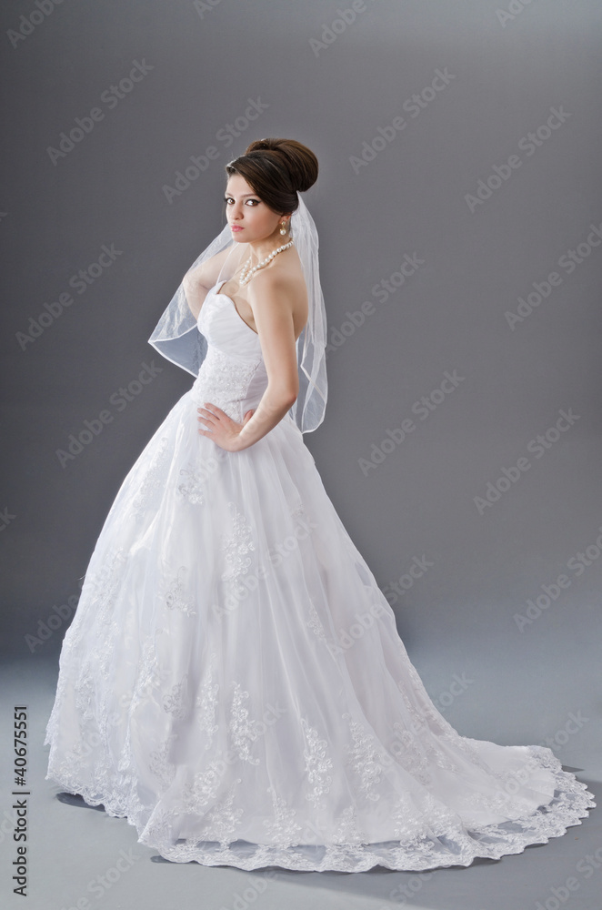 Bride in wedding dress in studio shooting