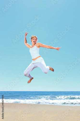 young beautiful woman jumping © Netfalls