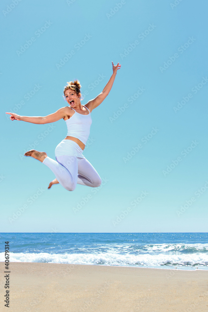 young beautiful woman jumping