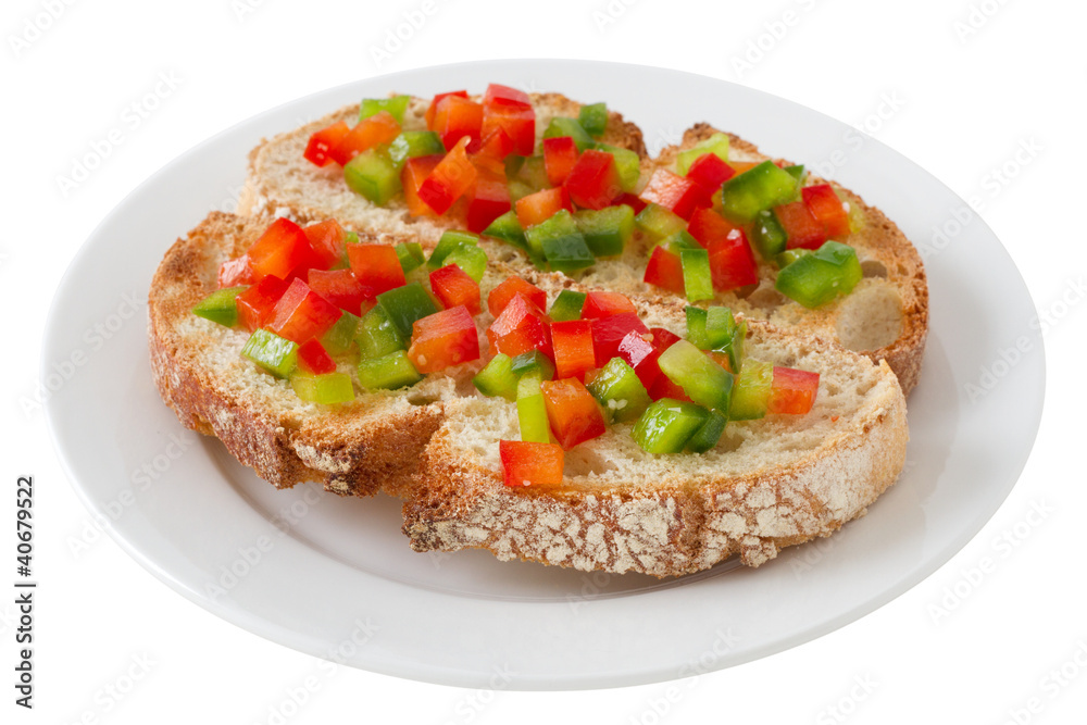 toasts with cut pepper on the plate
