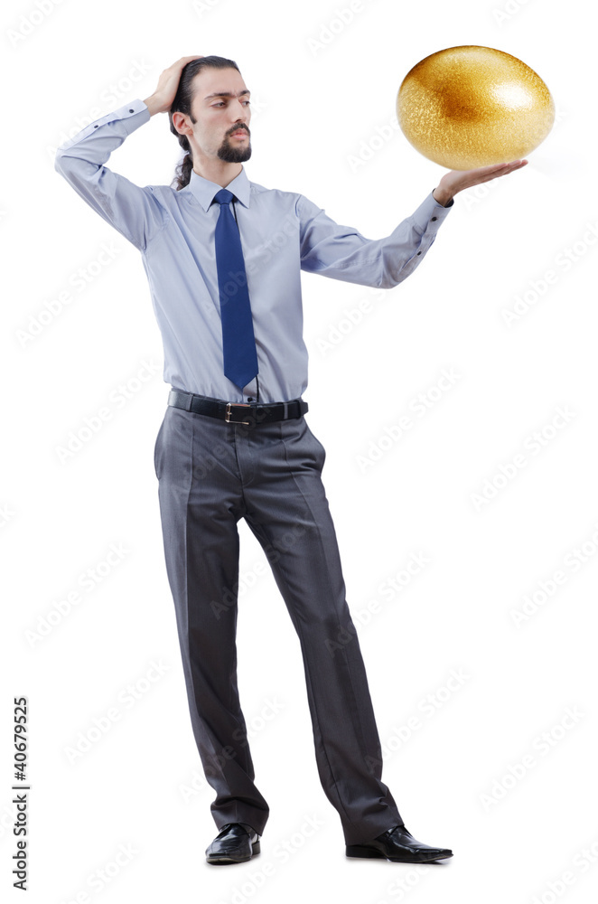 Fototapeta premium Man and golden egg isolated on white