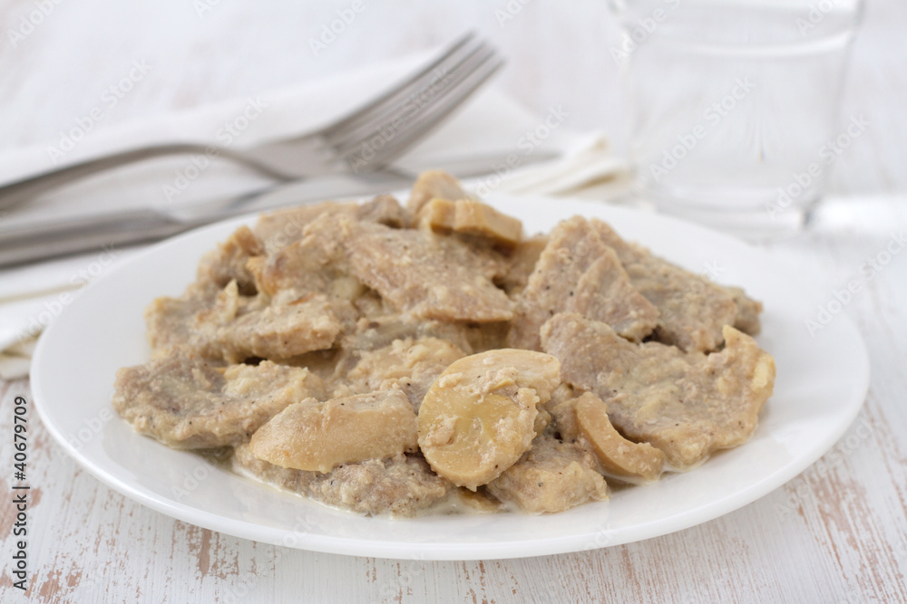 pork with mushrooms on the plate pork with mushrooms on the plate