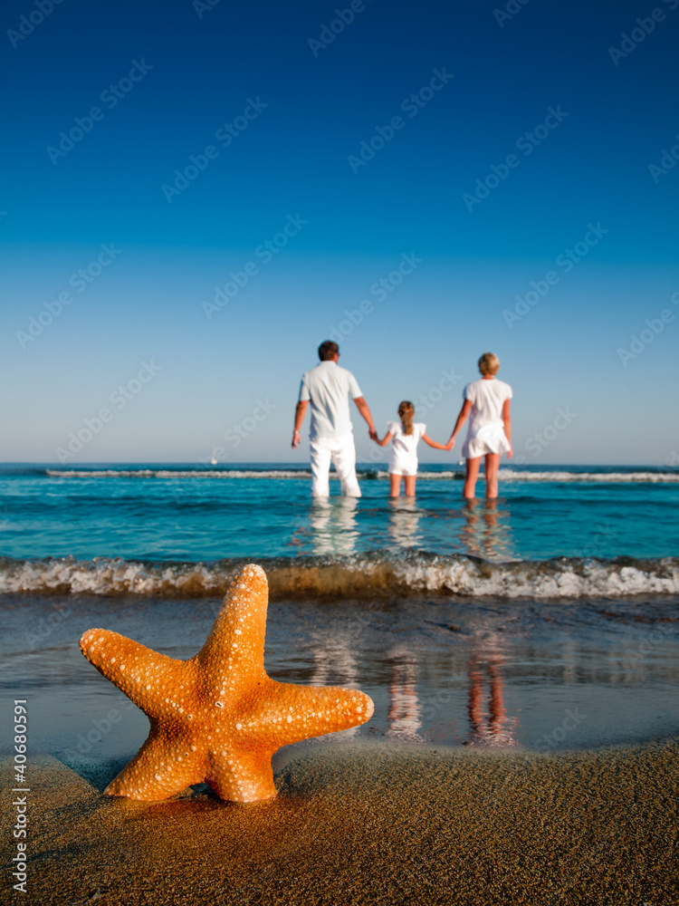 summer holiday - family at the beach