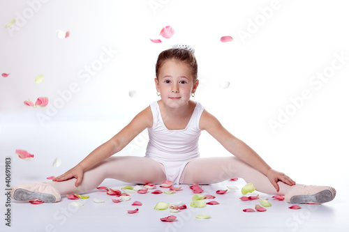Young ballerina exercising photo