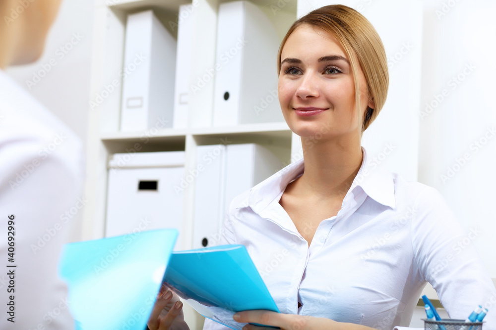 Portrait of a business woman in office Portrait of a business woman in office