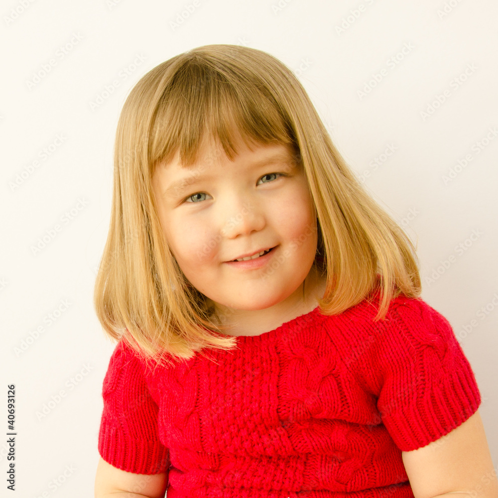 Adorable smiling little girl with blond hair Adorable smiling little girl with blond hair