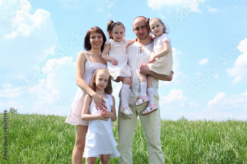 family with children in summer day outdoors