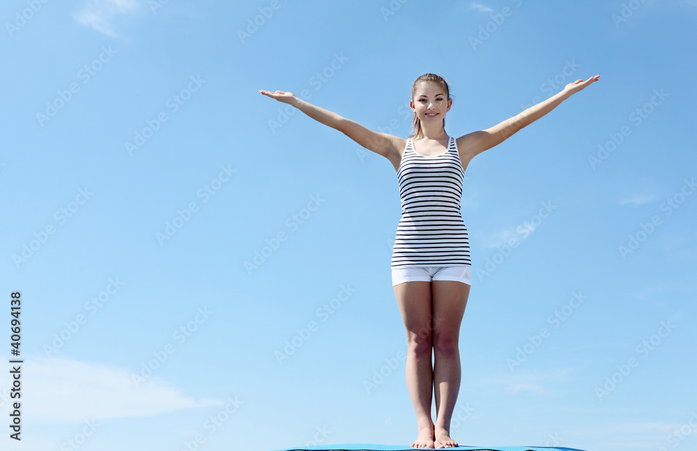 Portrait of a young woman doing exercises Portrait of a young woman doing exercises