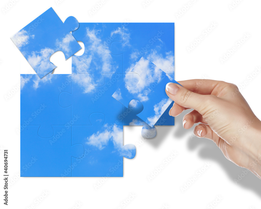 Puzzle with blue sky and white clouds Puzzle with blue sky and white clouds