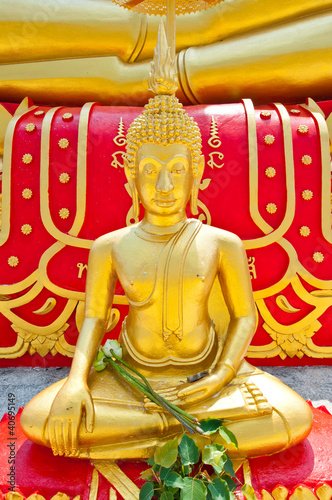 Golden buddha at Sakete temple photo