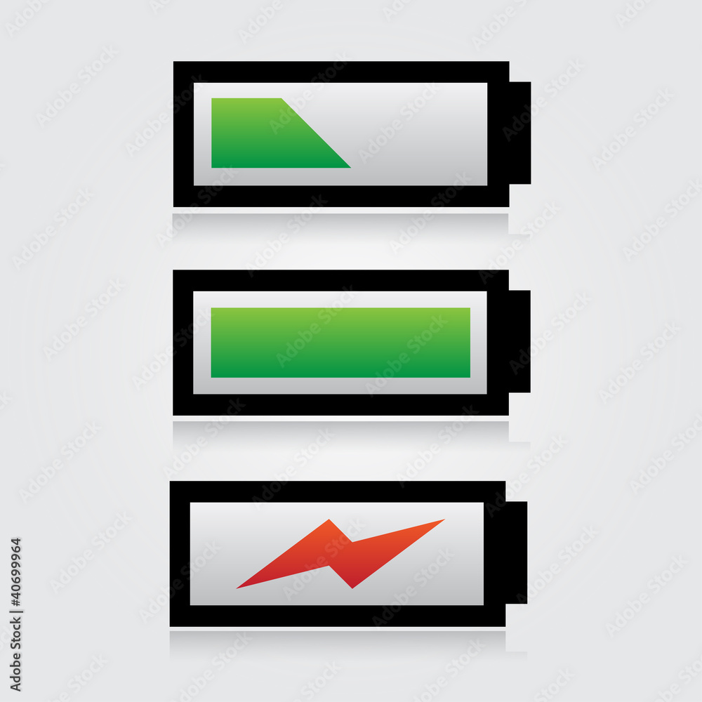 Set of batteries on grey background Set of batteries on grey background