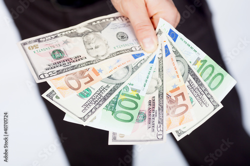 Man with dollar and euro