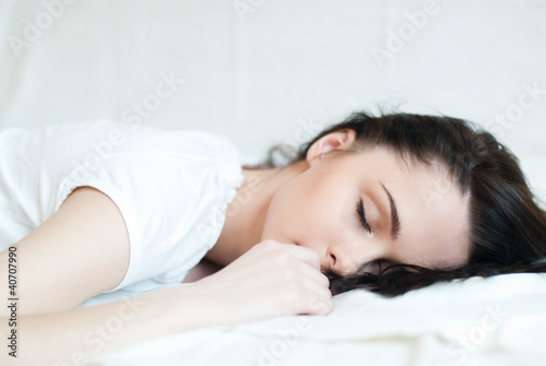 portrait of a beautiful sleeping brunette