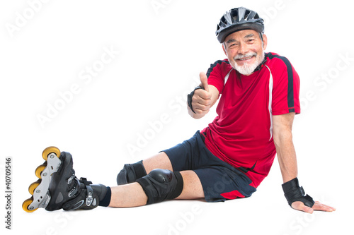 Obraz na płótnie senior man inline skating