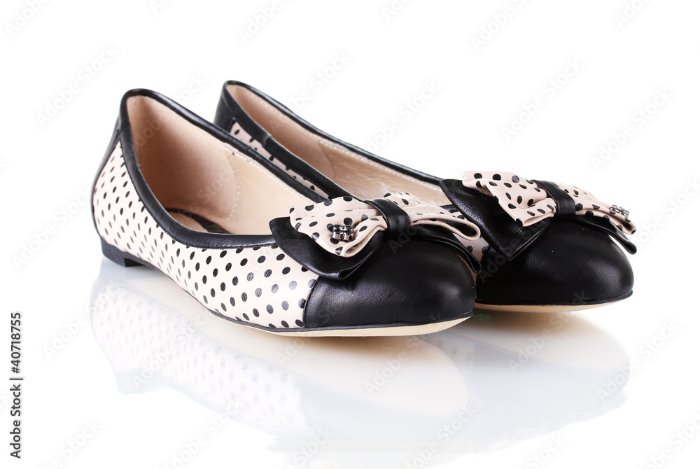 Female flat ballet shoes patterned with black polka dots Female flat ballet shoes patterned with black polka dots
