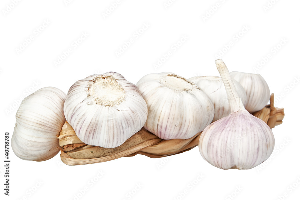 Obraz premium Braid of garlic on a white background.