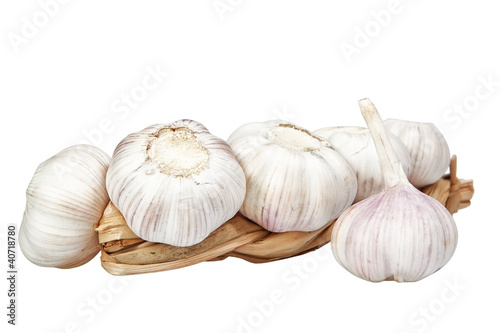 Braid of garlic on a white background.