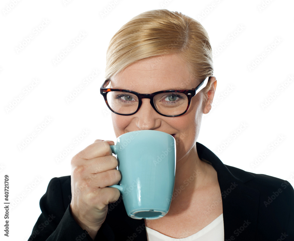 Attractive corporate female drinking coffee Attractive corporate female drinking coffee