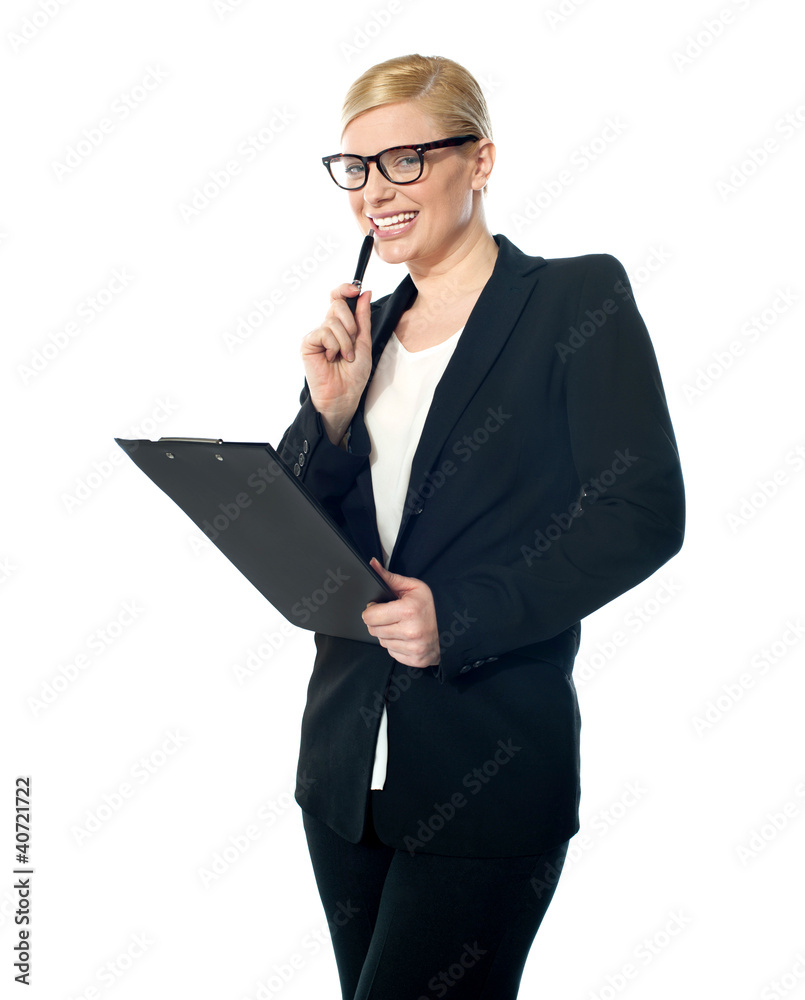 Smiling mischievous female business executive Smiling mischievous female business executive
