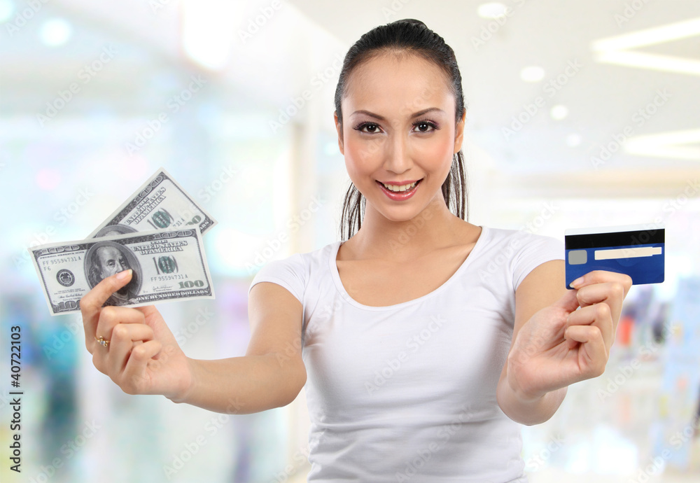 woman with money and credit card woman with money and credit card