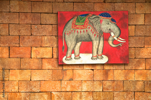 elephant painting on brick wall photo