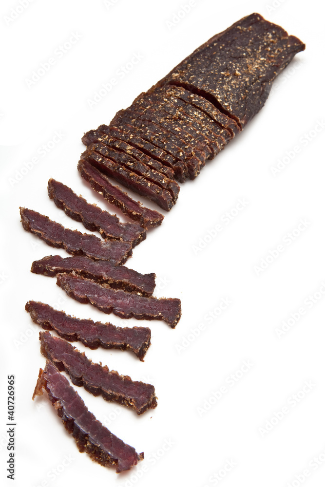 South African biltong (beef) isolated on a white background South African biltong (beef) isolated on a white background