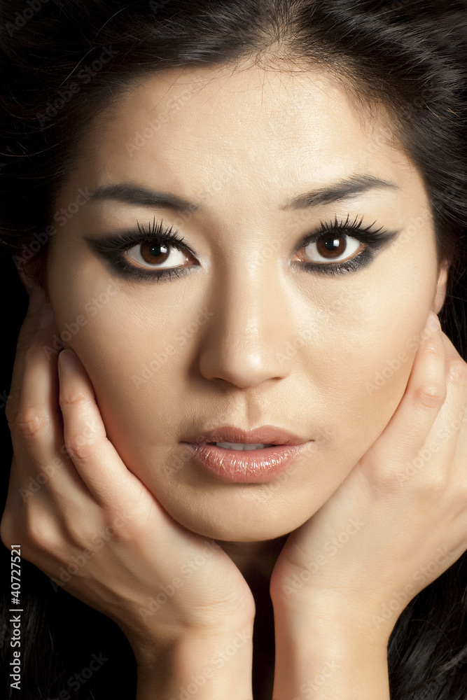 Fototapeta premium Beautiful asian woman face with grey background