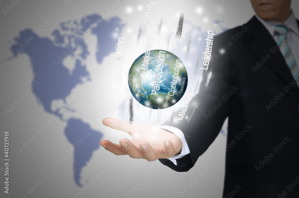 Hand of Business Man Hold Earth Globe surround by Business word. Hand of Business Man Hold Earth Globe surround by Business word.