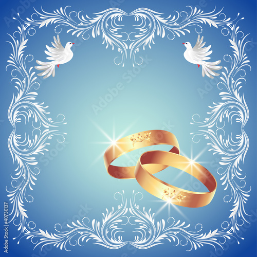 Wedding rings and two doves