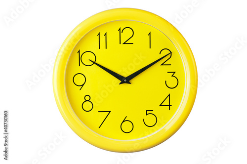 yellow clock on a white background,place for your own text, pict