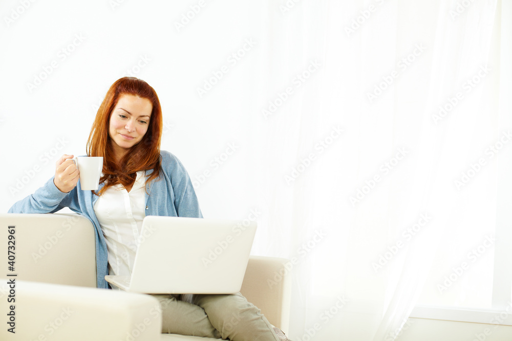 Pretty young woman resting alone on laptop Pretty young woman resting alone on laptop