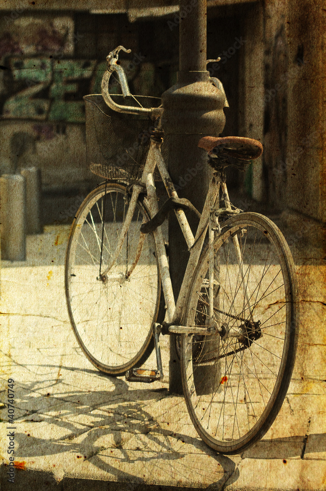 old bicycle. Photo in old image style.