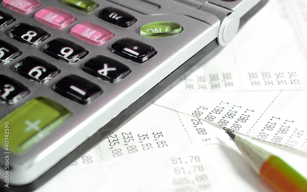 Business concept-calculator,pencil and bills Business concept-calculator,pencil and bills