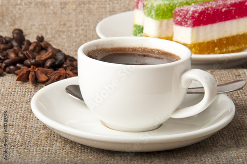 Fototapeta Naklejka Na Ścianę i Meble -  cup of coffee, coffee beans and marmalade