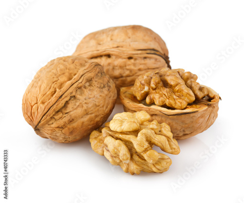 Open walnuts isolated on white