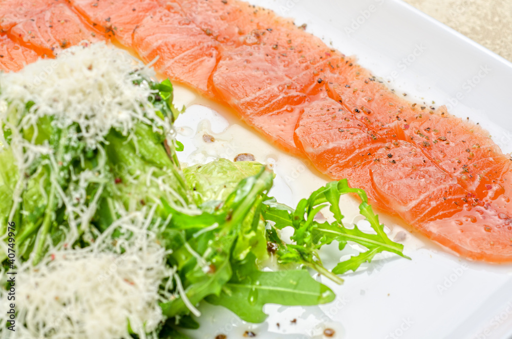 Fish Carpaccio with salad