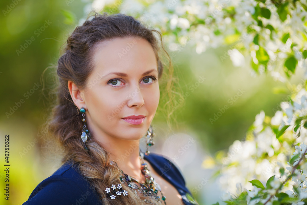 Beautiful woman in a spring garden Beautiful woman in a spring garden