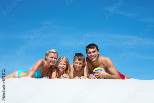 Family on sand