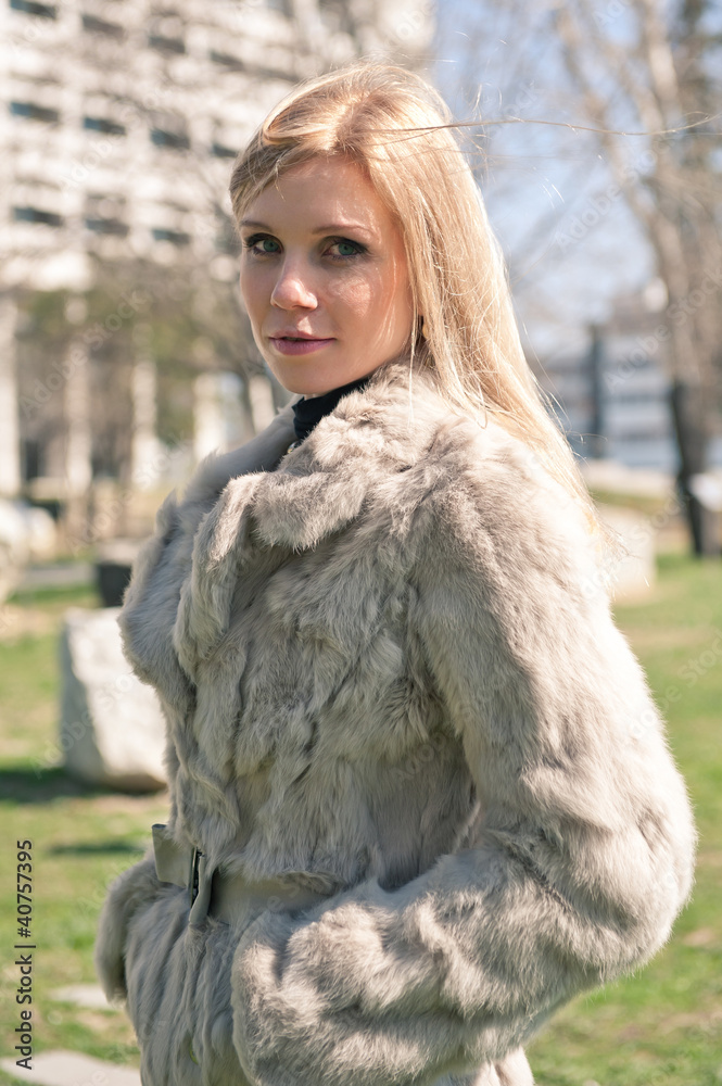 Portrait of young attractive woman with fur. Portrait of young attractive woman with fur.