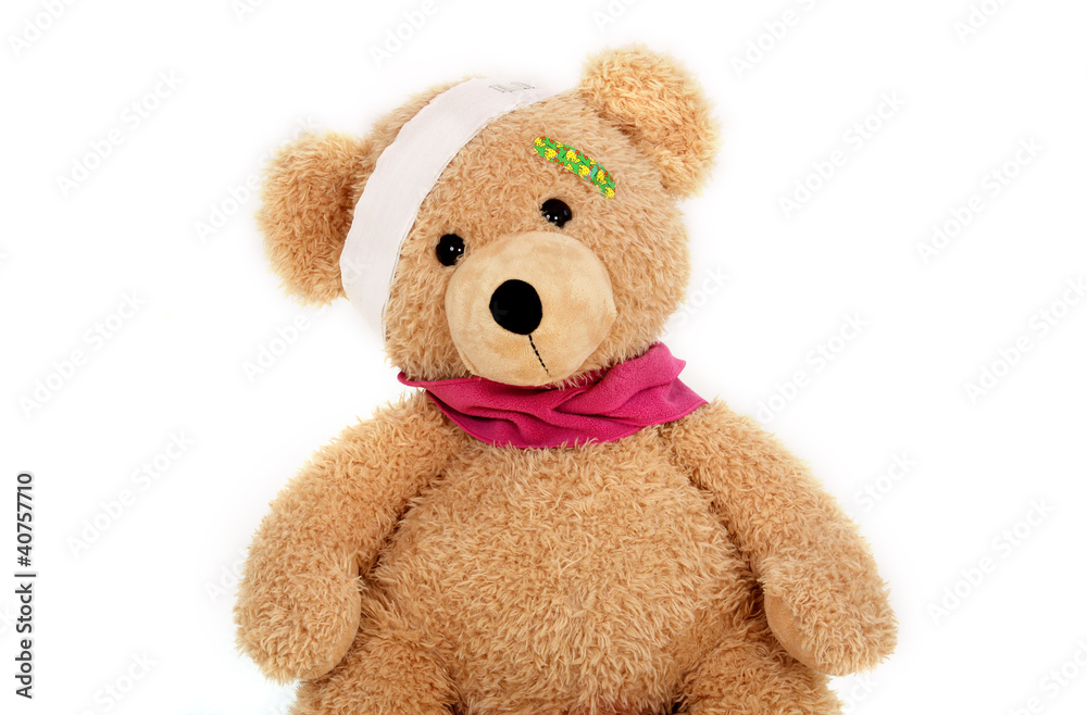 Obraz premium Teddybär mit einem Kopfverband