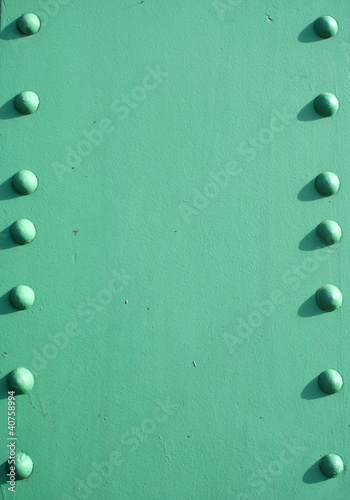 Steel girder with rivets