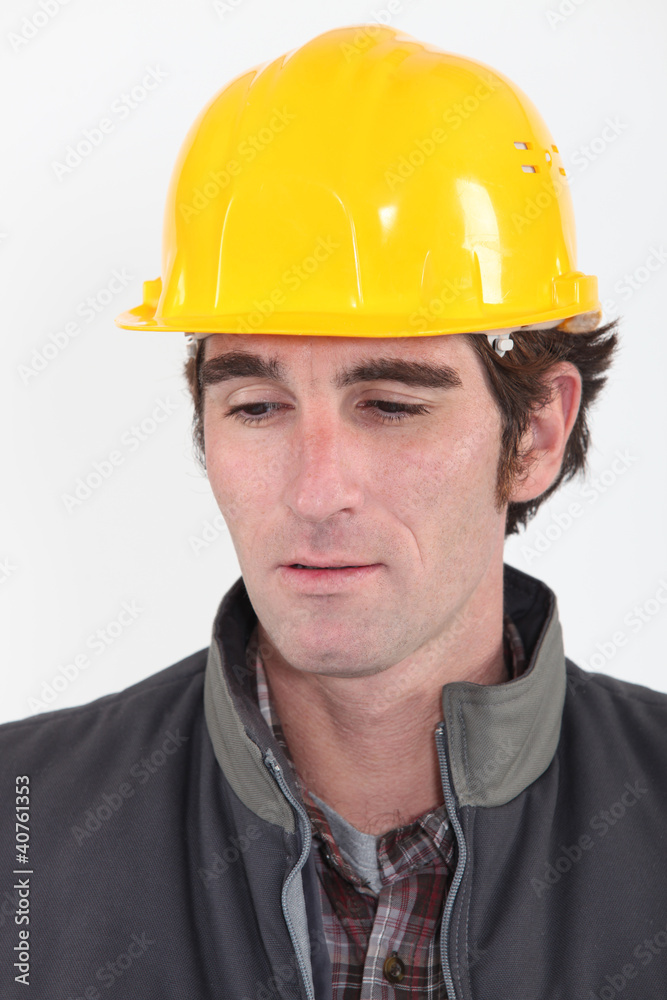 head and shoulders portrait of pensive craftsman head and shoulders portrait of pensive craftsman