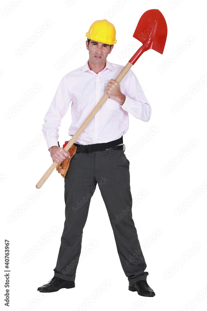 Businessman with a hardhat and shovel Businessman with a hardhat and shovel