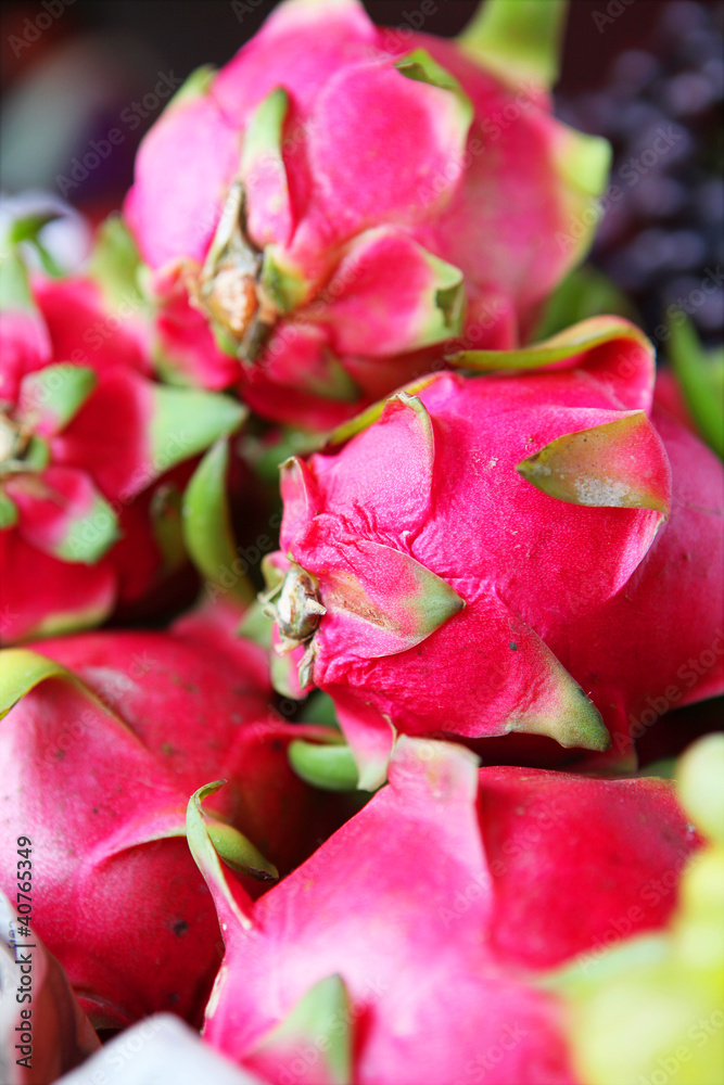 Lot of dragon fruits in the tropical market Lot of dragon fruits in the tropical market