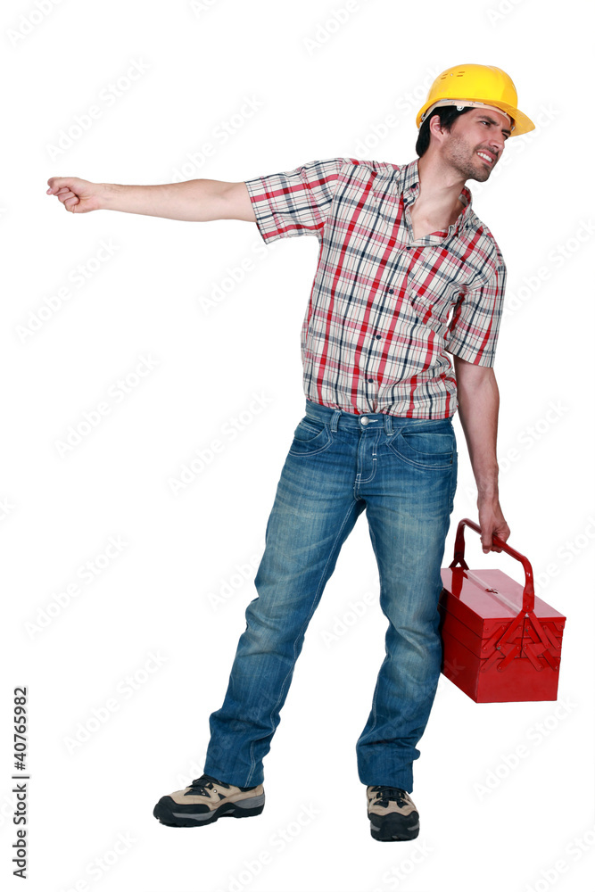 Tradesman pulling a heavy object Tradesman pulling a heavy object
