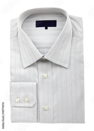 A new grey man's shirt isolated over a white background