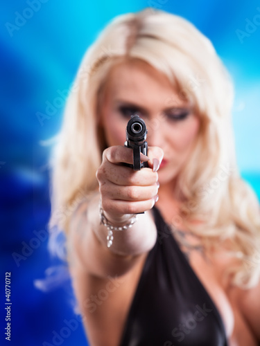 beautiful sexy girl holding gun photo