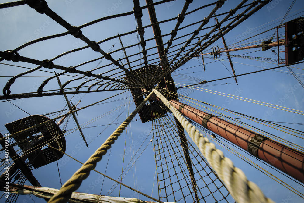 Fototapeta premium Three masts on tall merchant ship with ropes and ladders