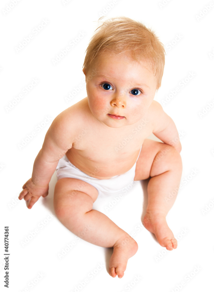 Cute infant girl sitting isolated on white Cute infant girl sitting isolated on white